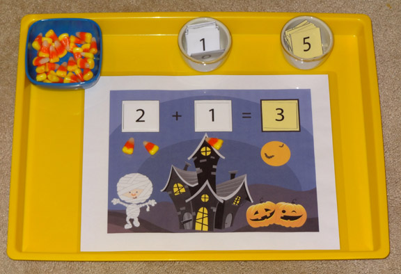 Halloween Montessori activities: Halloween addition game with candy corn manipulatives || Gift of Curiosity