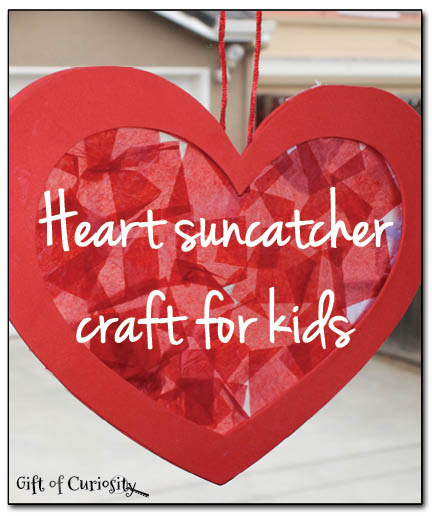 Heart suncatcher craft for kids. A perfect craft for Valentine's Day! || Gift of Curiosity