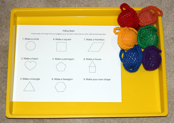 Teaching shapes with the Spielgaben balls and strings, plus a free printable you can use to teach shapes to your kids || Gift of Curiosity