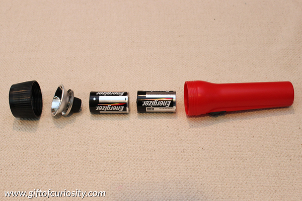 how to put batteries in flashlight? 2