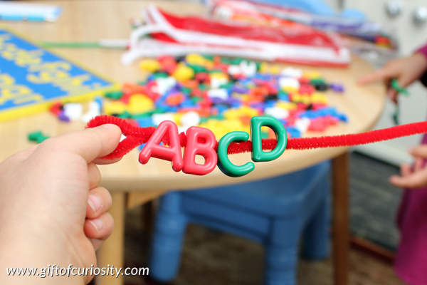 Putting letters in alphabetical order: One of many hands-on ideas for building alphabet knowledge that go beyond simple letter recognition to help your child get ready for reading || Gift of Curiosity
