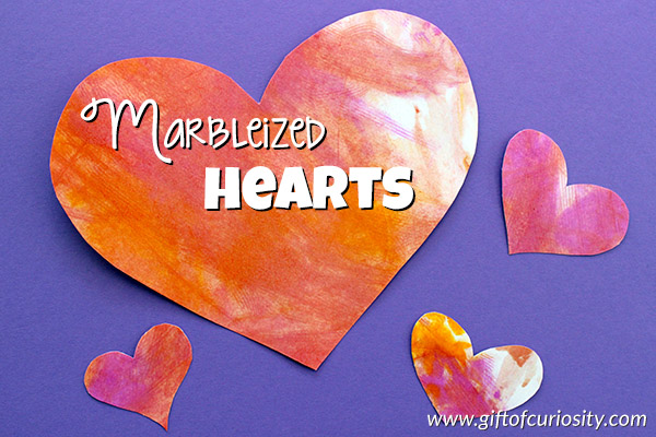 Marbleized heart craft for Valentine's Day made using shaving cream and liquid watercolors. So pretty! || Gift of Curiosity