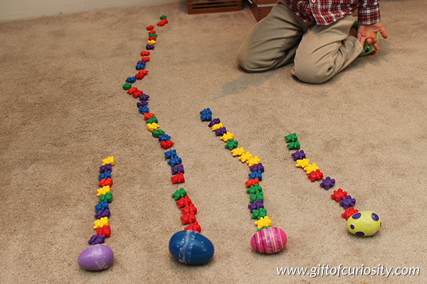 Easter egg balance scale activity. This is such fun way to build math skills with kids! || Gift of Curiosity