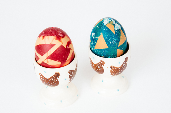 Scotch tape resist Easter egg decorating from In the Playroom