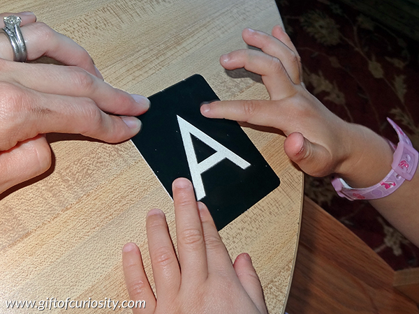 How I use Montessori sandpaper letters as a foundational tool for teaching my kids proper letter formation. || Gift of Curiosity