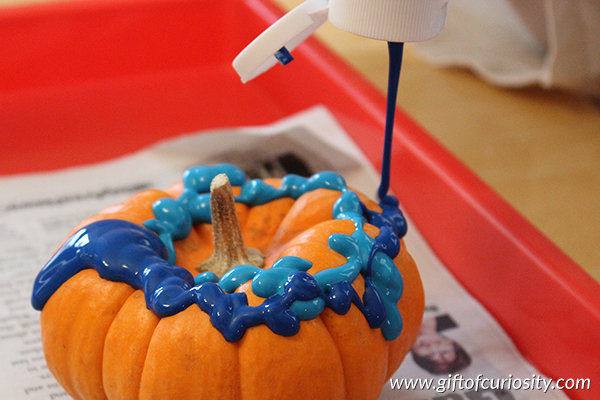 Drip-painted pumpkins - a beautiful way to decorate pumpkins for Halloween! OMG I love this! || Gift of Curiosity