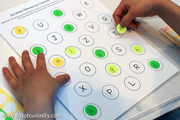 FREE Dot Sticker Uppercase and Lowercase Letter Matching printable activity supports letter knowledge and fine motor skills at the same time. What a fun idea for teaching the alphabet while kids are going through a sticker-loving phase! || Gift of Curiosity