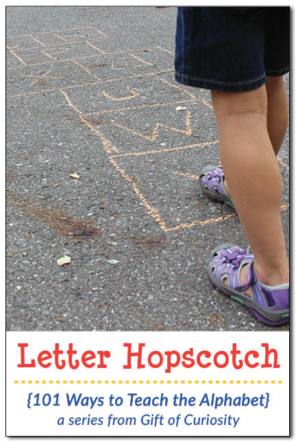 Play letter hopscotch to help your child learn the alphabet. This fun gross motor game can be used to teach letter names and/or letter sounds. || Gift of Curiosity