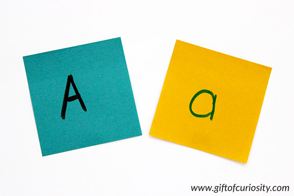 Matching uppercase and lowercase letters with sticky notes. Part of the 101 Ways to Teach the Alphabet series from Gift of Curiosity