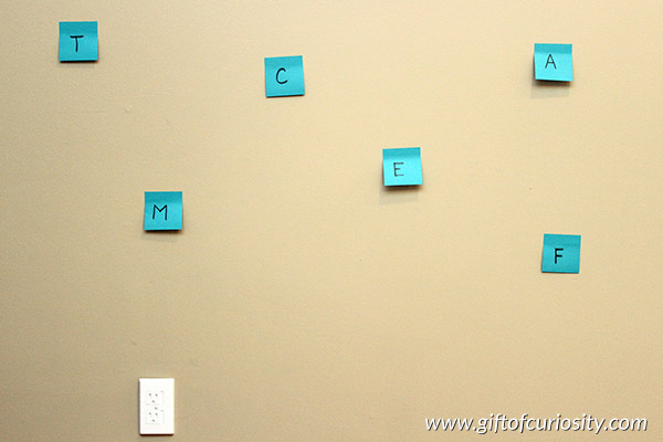 Matching uppercase and lowercase letters with sticky notes. Part of the 101 Ways to Teach the Alphabet series from Gift of Curiosity