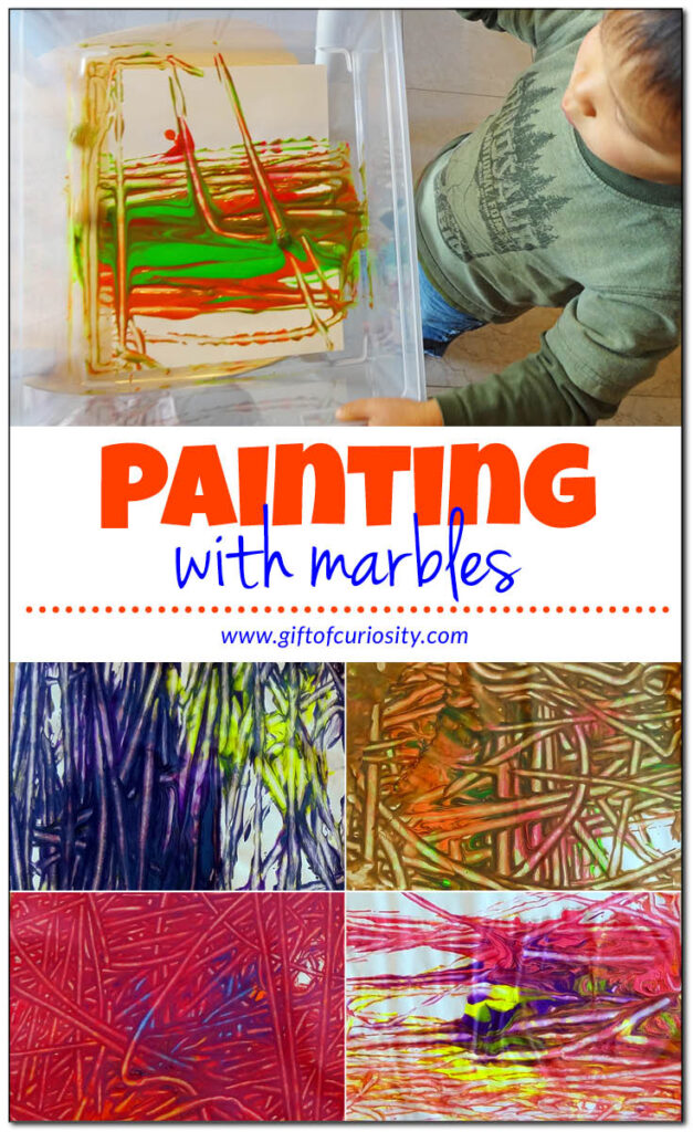 Painting with marbles is a whole new way for kids to paint that they can really throw their whole bodies into! #artsandcrafts #paintingwithmarbles #giftofcuriosity